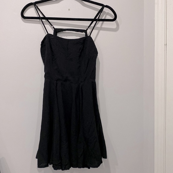 Forever 21 Dresses & Skirts - Brand new back less Dress never worn zipper on the side double lining